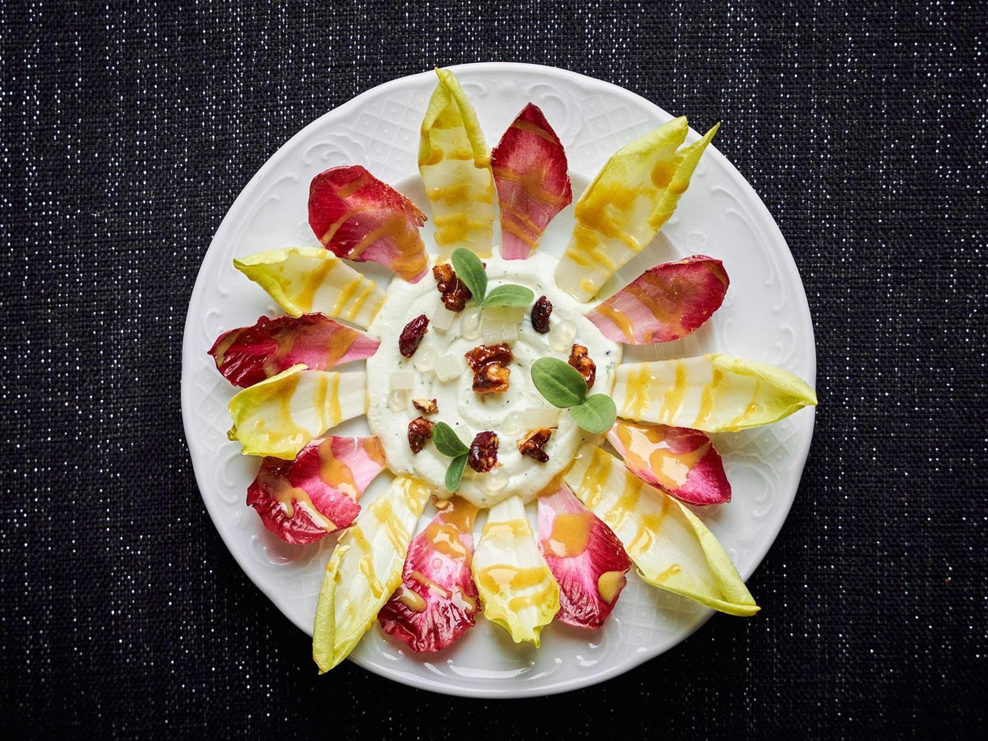 Sofitel Dubai The Obelisk Hotel Exterior photo A salad of chicory, goat's cheese and walnuts